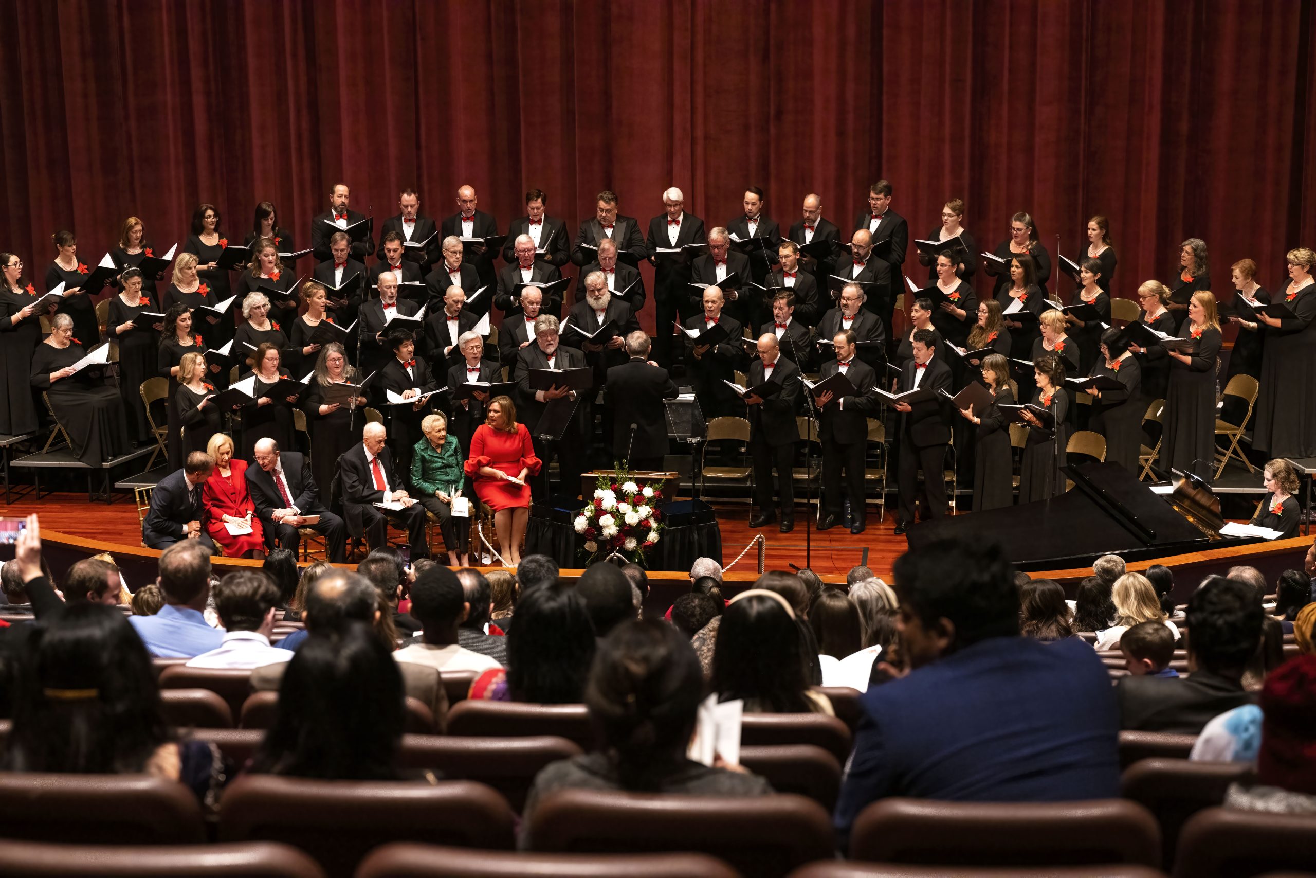 The Washington DC Temple Choir performing during the Festival of Lights in the Washington DC Temple Visitors' Center Auditorium.