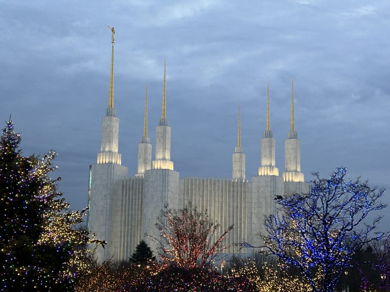 The Washington D.C. Temple can be seen in the background during the 46th annual Festival of Lights. Courtesy of John Butler